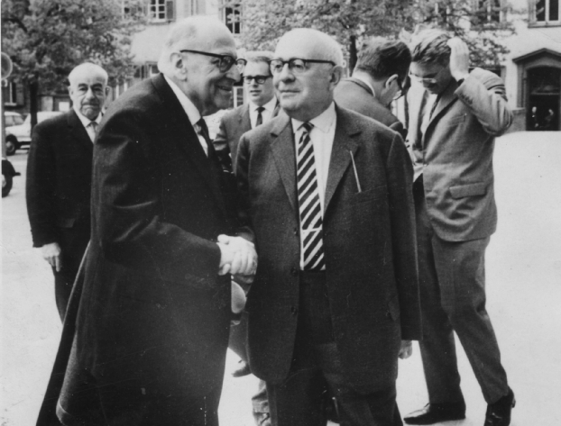 Max Horkheimer (front left), Theodor Adorno (front right), and Jürgen Habermas in the background, right, in 1965 at Heidelberg
