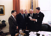 Reagan meets with (left to right) Secretary of Defense Caspar Weinberger, Secretary of State George Shultz, Attorney General Ed Meese, and Chief of Staff Don Regan in the Oval Office