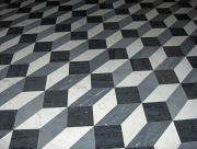 Floor tiles at the Basilica of Saint John Lateran are an early example of an "op art" effect.