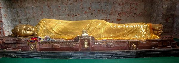 The ancient excavated Buddha-image inside the Parinirvana Temple, Kushinagar.