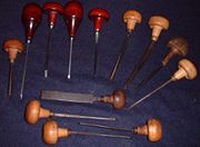 An assortment of tools used for hand engraving.