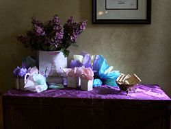 A table with wrapped gifts.
