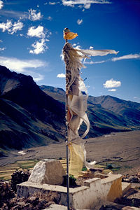Prayer flag above the monastery (Gompa) of Tanze, in the Kurgiakh valley.