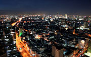Part of the Bangkok skyline at night.