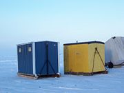 Three ice shanties