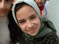An Iraqi girl living next to Al Daura Oil Refinery.