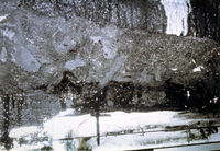 Faulty Sakno silicone foam firestop installation in the Calgary sewage treatment plant in the 1980s, used to seal the opening above a fire door in a cast concrete fire separation.
