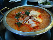 Kimchi Jigae (Stew). A popular stew made with kimchi, it is commonly cooked with kimchi, fresh vegetables and pork or tuna although countless variations exist.