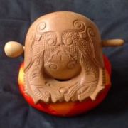 A Chinese wooden fish, a percussion instrument used in Buddhist recitations