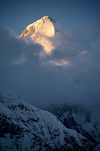 Peak of Khan Tengri at sunset. Photo taken by Simon Garbutt in July 2002.