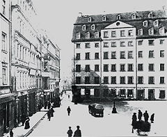 A photograph of the outside of Bach's apartment at the end of the Thomasschule, taken before its demolition in 1902; three steps can be seen leading to the front door