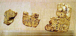 Linear A incised on tablets found in Akrotiri, Santorini.