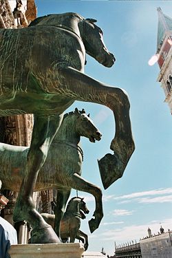 These Horses of Saint Mark are a replica of the Triumphal Quadriga captured in Constantinople in 1204 and carried to Venice as a trophy.