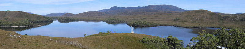 The spectacular and isolated Bathurst Harbour, Southwest National Park in the Tasmanian Wilderness World Heritage Area.