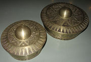 The different sized brass kulintang gongs.