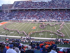 The Marching Illini, the first band to perform a halftime show at a football game