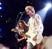 Kurt Cobain (front) and Krist Novoselic (left) of Nirvana performing live at MTV Video Music Awards 1992.