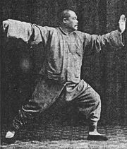 Yang Chengfu in a posture from the Yang style tai chi chuan solo form known as Single Whip c. 1931