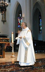 Roman Catholic deacon wearing a dalmatic
