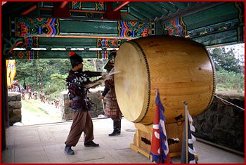 Soldier beating the ceremonial drum