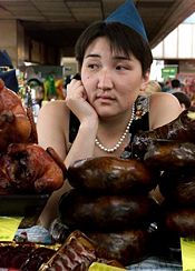 A meat vendor at the Green Market in Almaty, Kazakhastan.