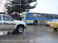 Kabul's public bus (Millie Bus) carrying passengers.