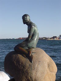 The statue of The Little Mermaid, a monument to Hans Christian Andersen, in Copenhagen harbor.