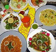 Variety of Somali dishes incorporating rice, vegetables, salads and stews.