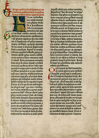 First page of the first volume of the Gutenberg Bible, printed with an early textur typeface c. 1455. The decorative colored initials were hand-lettered separately by a scribe.