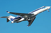 A Bombardier Global 5000 business jet takes off.