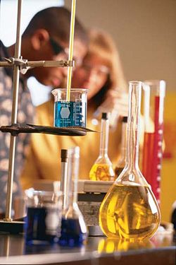 Experimental work in a chemical laboratory.