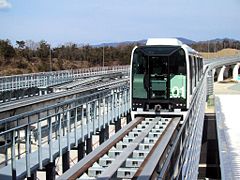 Linimo train approaching Banpaku Kinen Koen, towards Fujigaoka Station