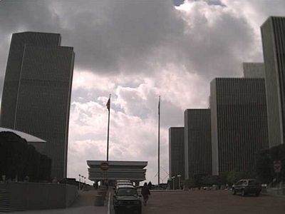 Empire State Plaza as seen from State Street. Left to right: The Egg performing arts center with Corning Tower behind, the Cultural Education Center combining the New York State Library & Archives, New York State Museum and an art gallery and four identical "Ageny" buildings.