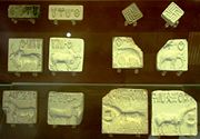 Seals from the Indus Valley Civilization preserved at the British Museum. The top right one shows swastikas, probably the oldest found.