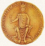 The seal of Philip Augustus, shown holding a fleur de lis in his right hand.
