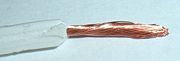 Conducting copper wire insulated by an outer layer of polyethylene.