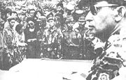 As Major General, Suharto (at right, foreground) attends funeral for assassinated generals October 5, 1965. (Photo by the Department of Information, Indonesia)