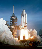 First reusable spacecraft: The Space Shuttle Columbia seconds after engine ignition, 12 April 1981 (NASA).
