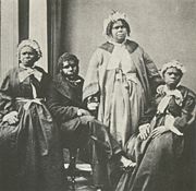 A picture of the last four "full-blooded" Tasmanian Aborigines c. 1860s. Truganini, the last to survive, is seated at far right.