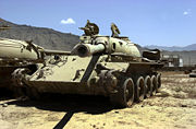 Two Soviet tanks left by the Soviet army during their withdrawal lay rusting in a field near Bagram Air Base, in 2003.