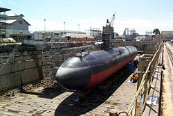 U.S. Navy submarine  USS Greeneville in dry dock, following collision with a fishing boat.