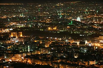 Damascus by night, pictured from Jabal Qasioun; the green spots are minarets