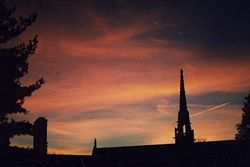 Sunset at Bryn Mawr College. The spire is that of Goodhart Hall, the main performance space.
