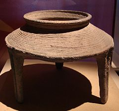 Pottery Ding (Cooking Vessel); Yangshao Culture; Neolithic period (ca. 5000 - 3000 B.C.E.); This ding, made by the Yangshao Culture located along the middle and lower reaches of the Yellow River, is decorated with a string pattern, and heated quickly.