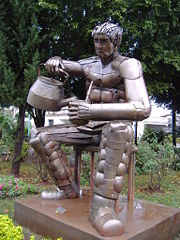 Statue of a man preparing mate, in Posadas, Misiones, Argentina