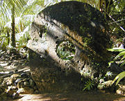 A large (approximately 8 feet (2.4 meters) in height) example of Yapese stone money in the village of Gachpar