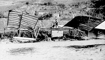 Glenn Curtiss or an assistant coaxes the structurally modified Langley Aerodrome into the air above the surface of Keuka Lake near Hammondsport, N.Y., September 17, 1914.