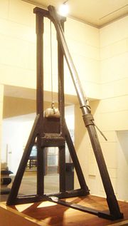 The Maiden, an older Scottish design of the Guillotine. This example is an exhibit at the Museum of Scotland, Edinburgh.