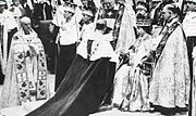 The coronation of Queen Elizabeth II, June 2, 1953. Prince Philip swears his allegiance to his wife and newly crowned sovereign.