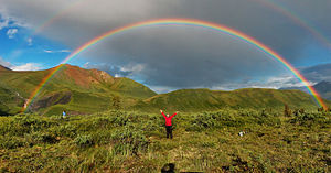 Semi-circle double rainbow (second one barely discernible) in Wrangell-St. Elias National Park, Alaska. Supernumerary rainbows can be seen on the inside of the primary arc. The sky inside the primary bow is brighter than that outside.